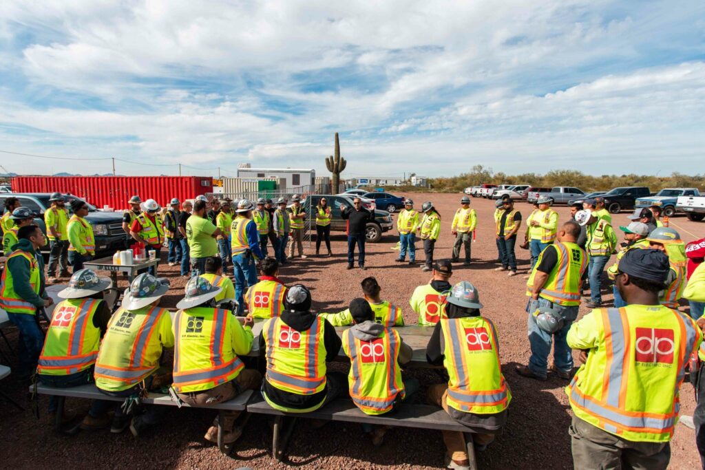 A group of construction workers awarded for their excellence in 2022.