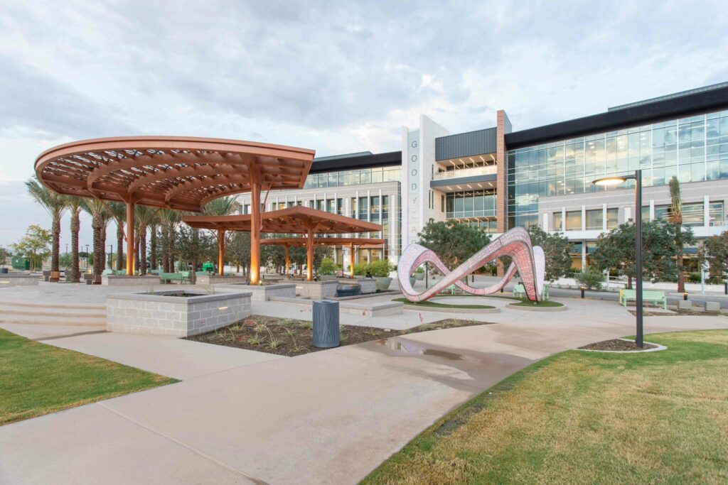 A building featuring a sculpture in front of it.